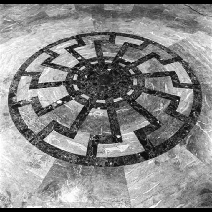 Illustrative image of the Black Sun symbol, historically linked to Nazi SS and used by modern extremist movements in Europe"