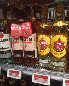 Bacardi and Havana Club rum bottles on supermarket shelves in Europe